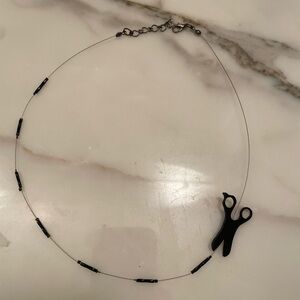 Cute choker necklace with plastic black scissors